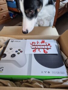 Sabrina Won this Xbox Bundle! Nice Doggy Winners Pic!